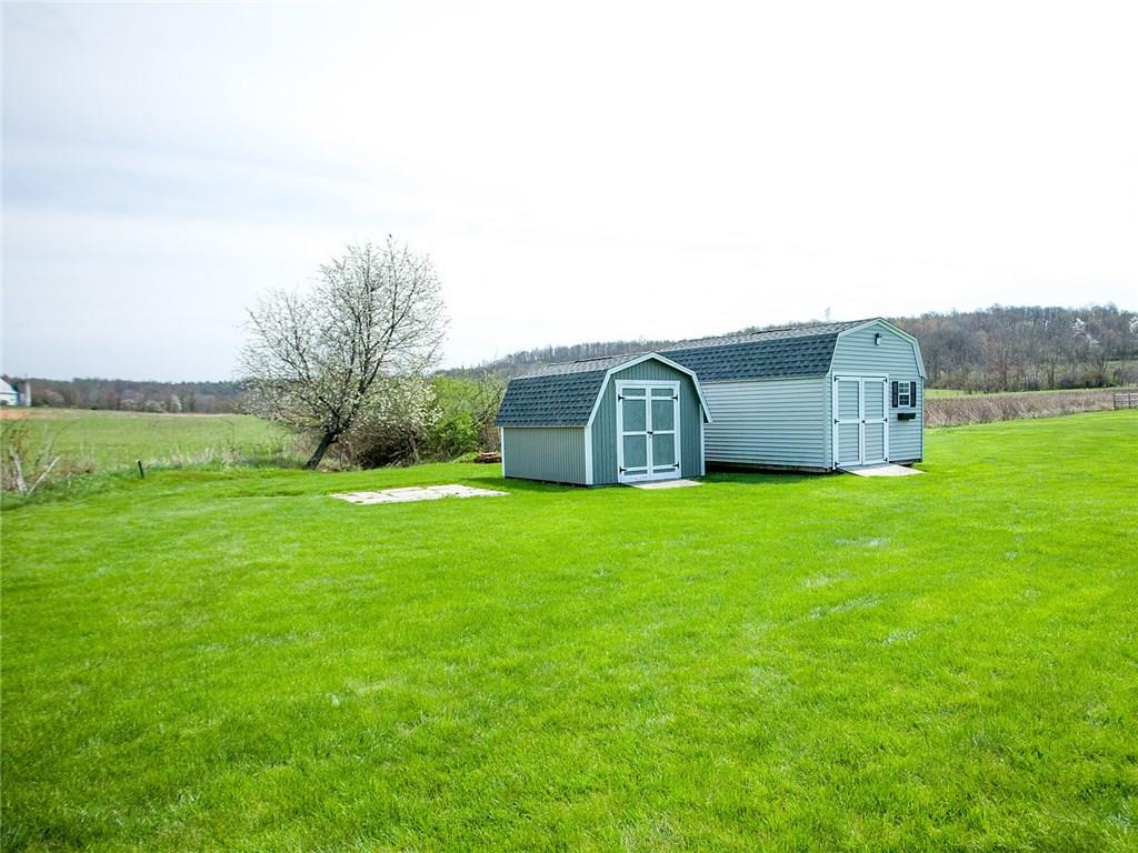 618 Cemetery Road Perryopolis, PA 15473 - Photo 22 of 25 2 storage sheds in rear yard. 1 is 9x12, and the other is 16x20. New shingles were put on both in 2015.