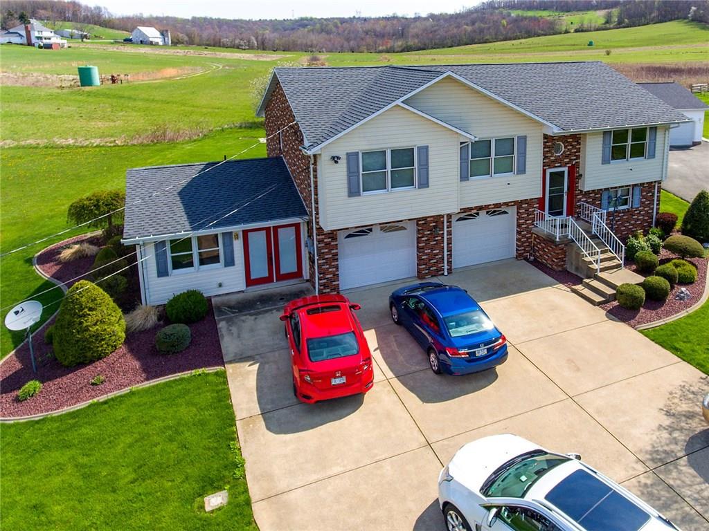 618 Cemetery Road Perryopolis, PA 15473 - Photo 6 of 25 3 car wide concrete driveway for plenty of off street parking.