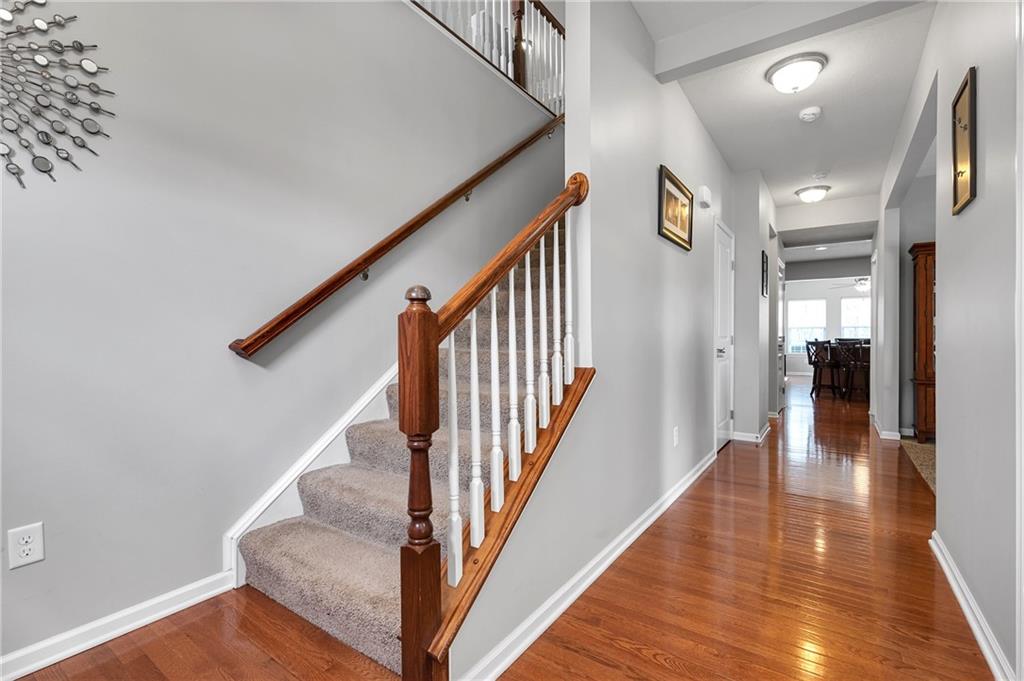 102 Pinyon Court McDonald, PA 15057 - Photo 2 of 24 a view of an entryway with wooden floor and stairs