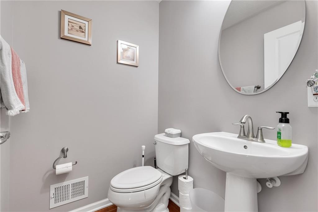 102 Pinyon Court McDonald, PA 15057 - Photo 11 of 24 a bathroom with a toilet and a sink