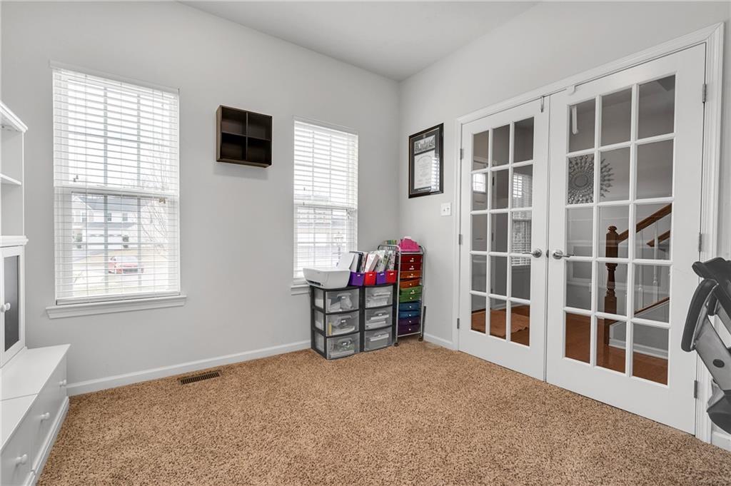 102 Pinyon Court McDonald, PA 15057 - Photo 3 of 24 a view of a livingroom with furniture and a window