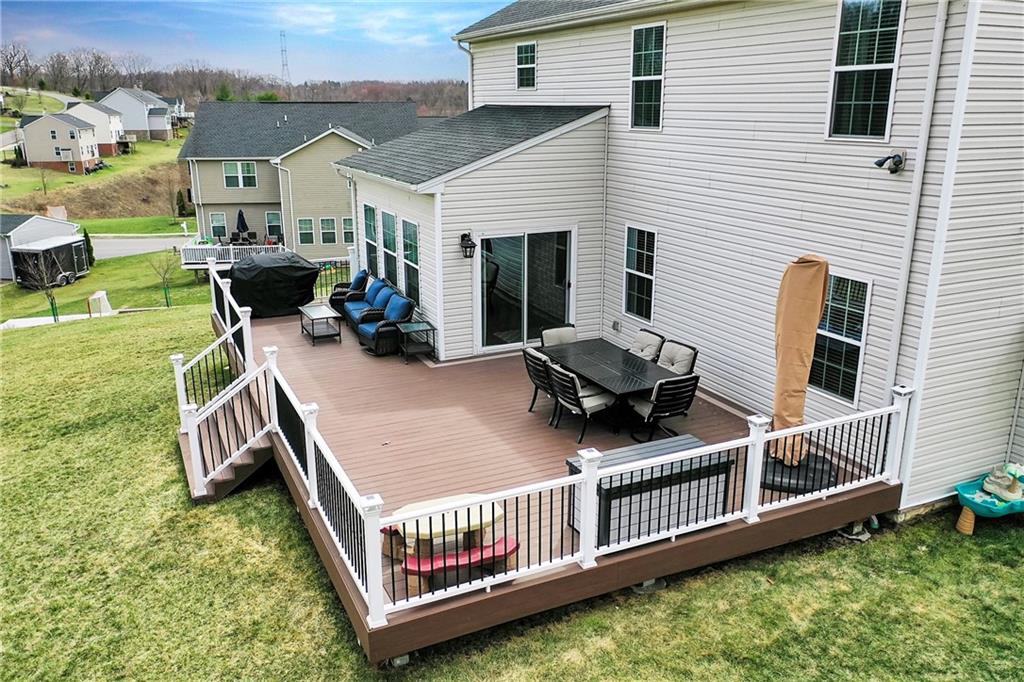 102 Pinyon Court McDonald, PA 15057 - Photo 22 of 24 a view of backyard with deck and furniture