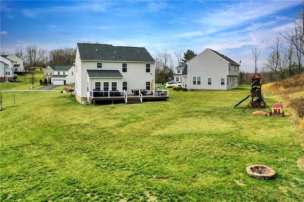 102 Pinyon Court McDonald, PA 15057 - Photo 23 of 24 a view of a house with backyard and sitting area