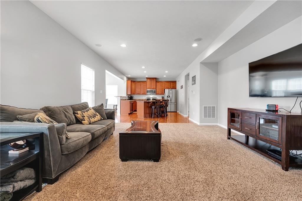 102 Pinyon Court McDonald, PA 15057 - Photo 5 of 24 a living room with furniture and a flat screen tv