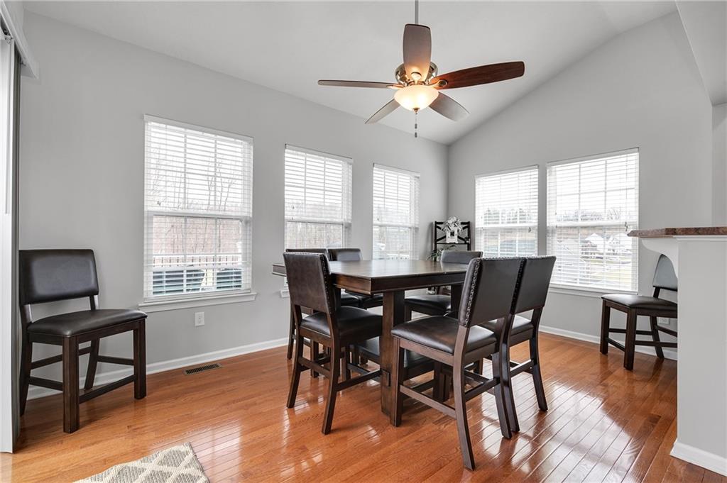 102 Pinyon Court McDonald, PA 15057 - Photo 9 of 24 a view of a dining room with furniture window and wooden floor