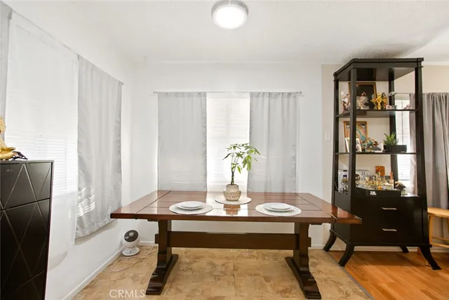 a view of a livingroom with furniture and window