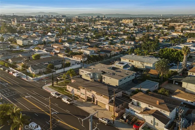 a view of a patio with table and chairs with wooden floor