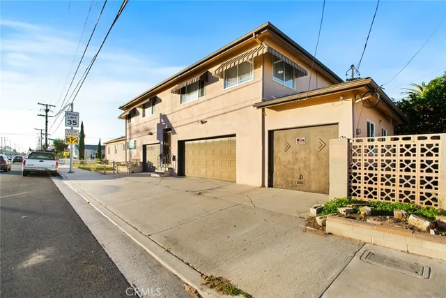 a front view of a house with a garage