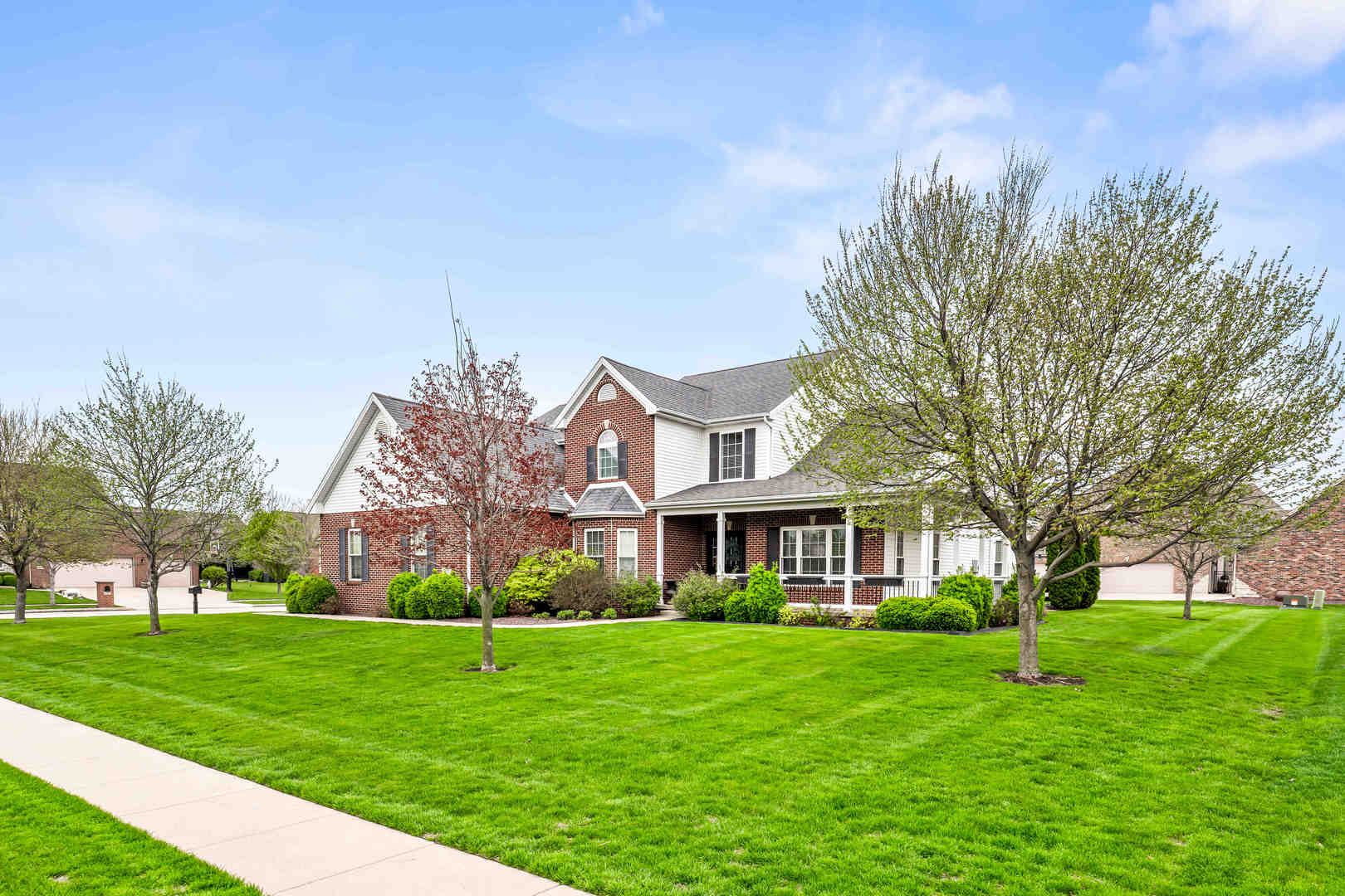 2213 Tyler Trail Bloomington, IL 61705 - Photo 2 of 58 a front view of building with yard