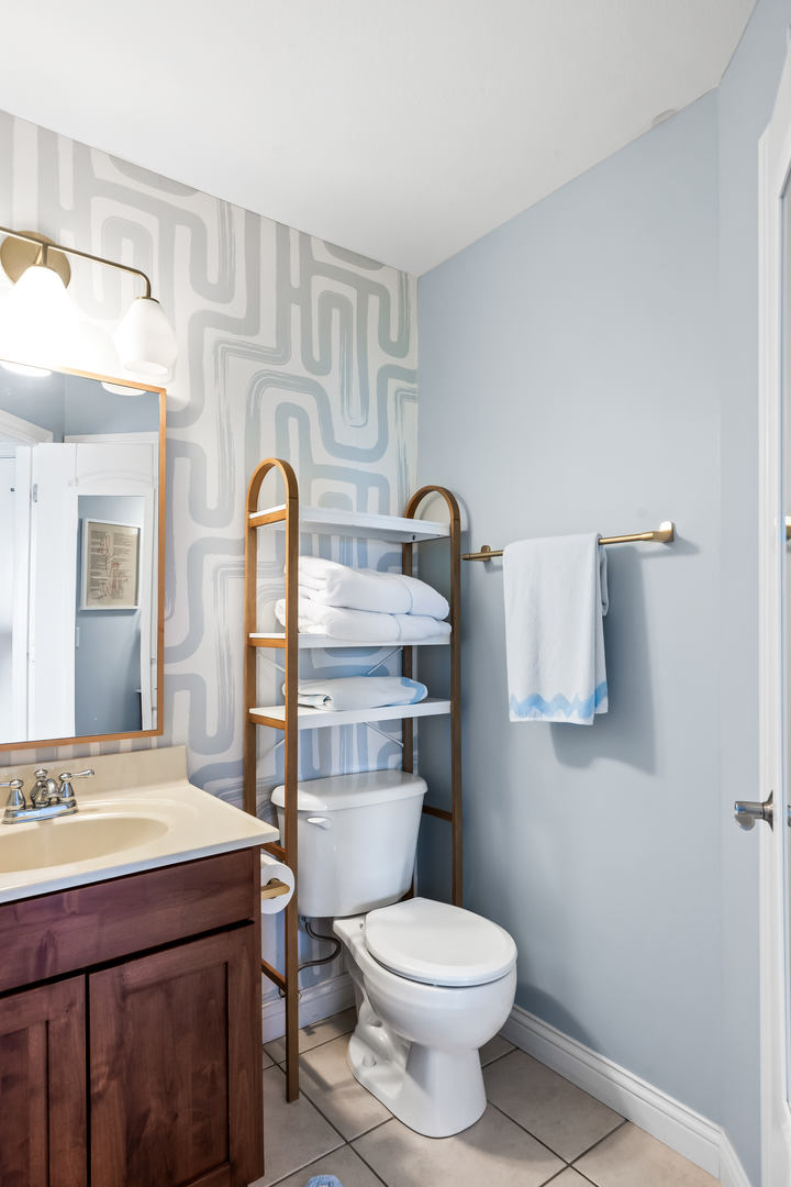 2213 Tyler Trail Bloomington, IL 61705 - Photo 36 of 58 a bathroom with a sink a toilet and mirror
