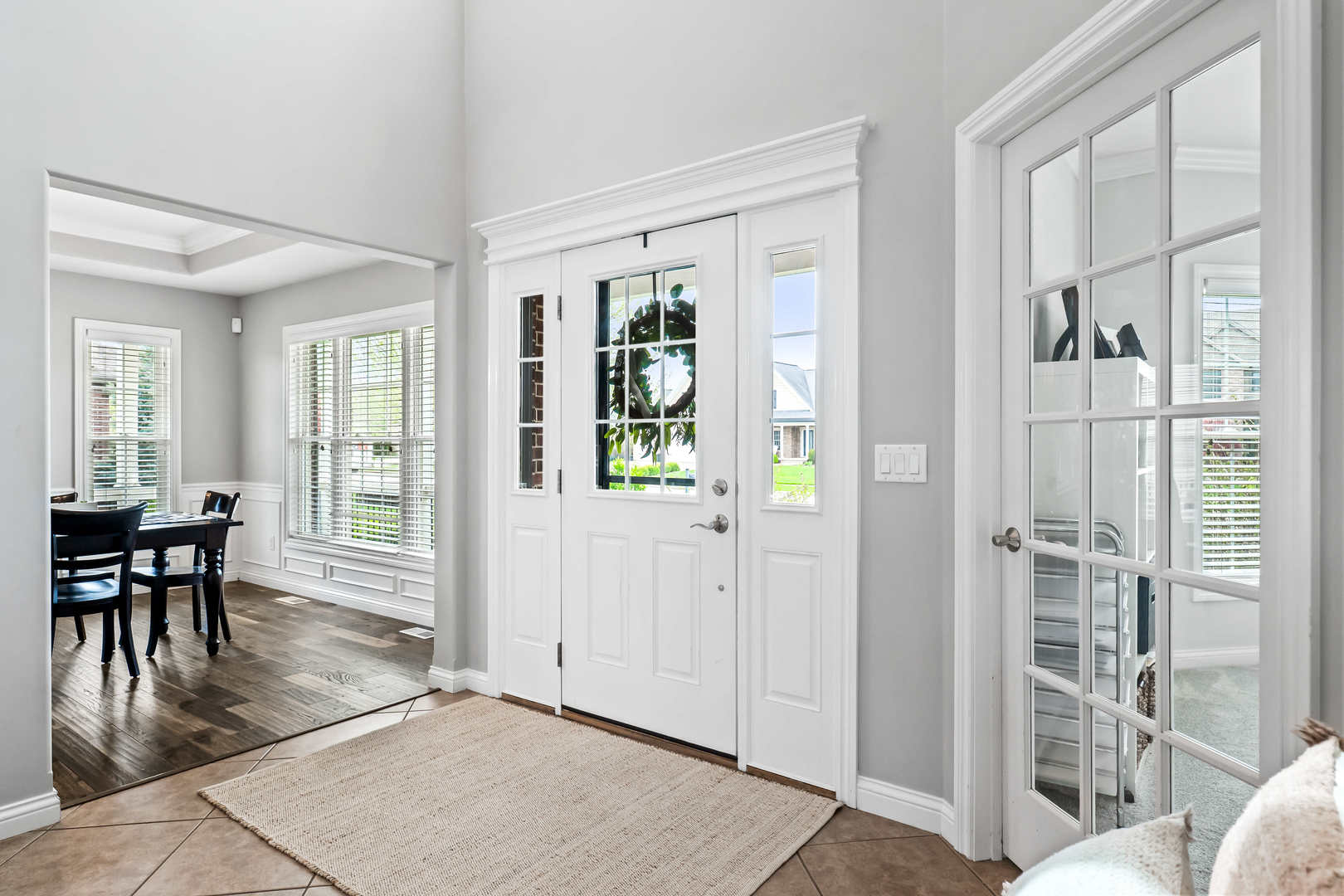 2213 Tyler Trail Bloomington, IL 61705 - Photo 6 of 58 a view of a livingroom with furniture window and wooden floor