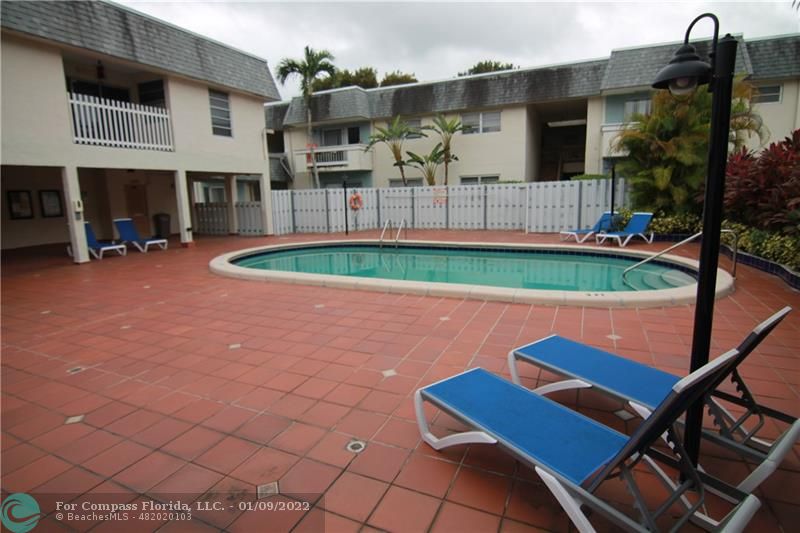 9360 Southwest 87th Avenue, Unit N8 Miami, FL 33176 - Photo 1 of 1 a view of outdoor space and yard