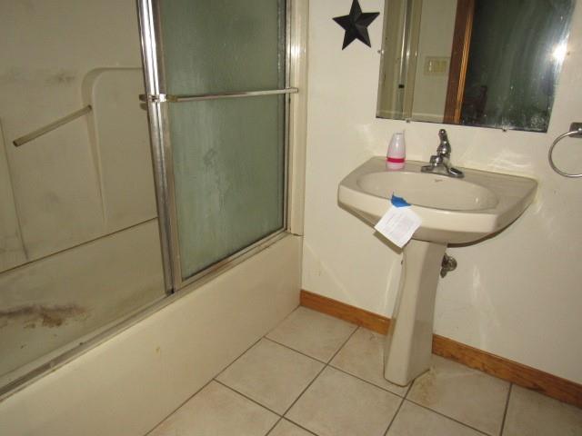 213 Stone Church Road Grindstone, PA 15442 - Photo 12 of 19 a bathroom with a sink and a mirror