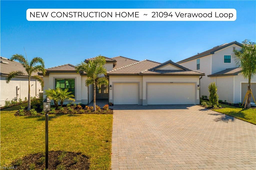 21094 Verawood Loop Estero, FL 33928 - Photo 1 of 49 a view of a house with a yard