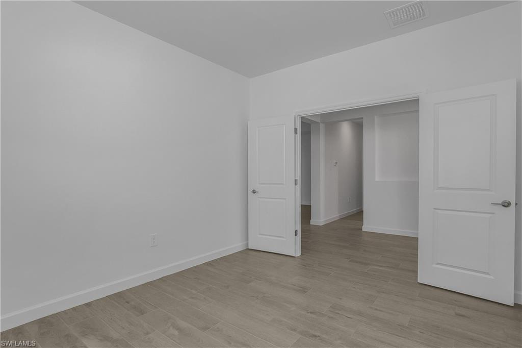 21094 Verawood Loop Estero, FL 33928 - Photo 18 of 49 a view of an empty room