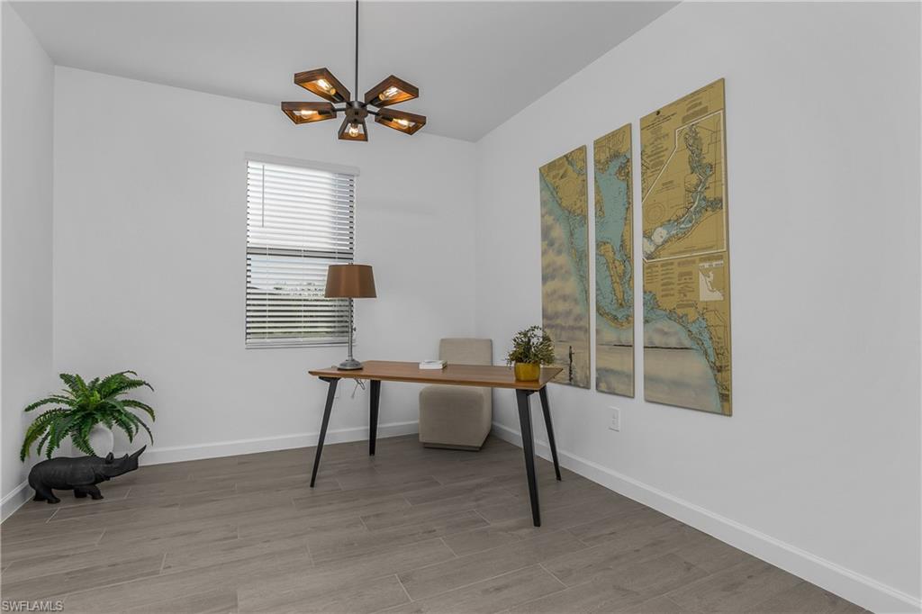 21094 Verawood Loop Estero, FL 33928 - Photo 19 of 49 a workspace with furniture and a window