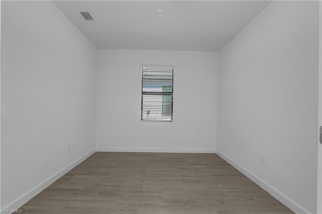 21094 Verawood Loop Estero, FL 33928 - Photo 20 of 49 wooden floor in an empty room