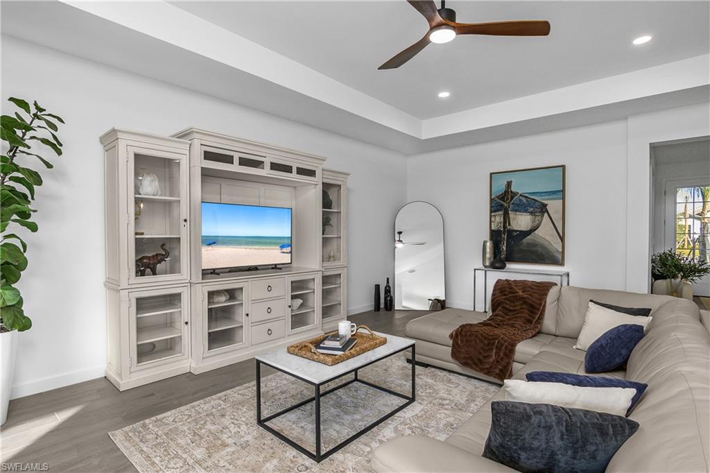 21094 Verawood Loop Estero, FL 33928 - Photo 21 of 49 a living room with furniture and a fireplace
