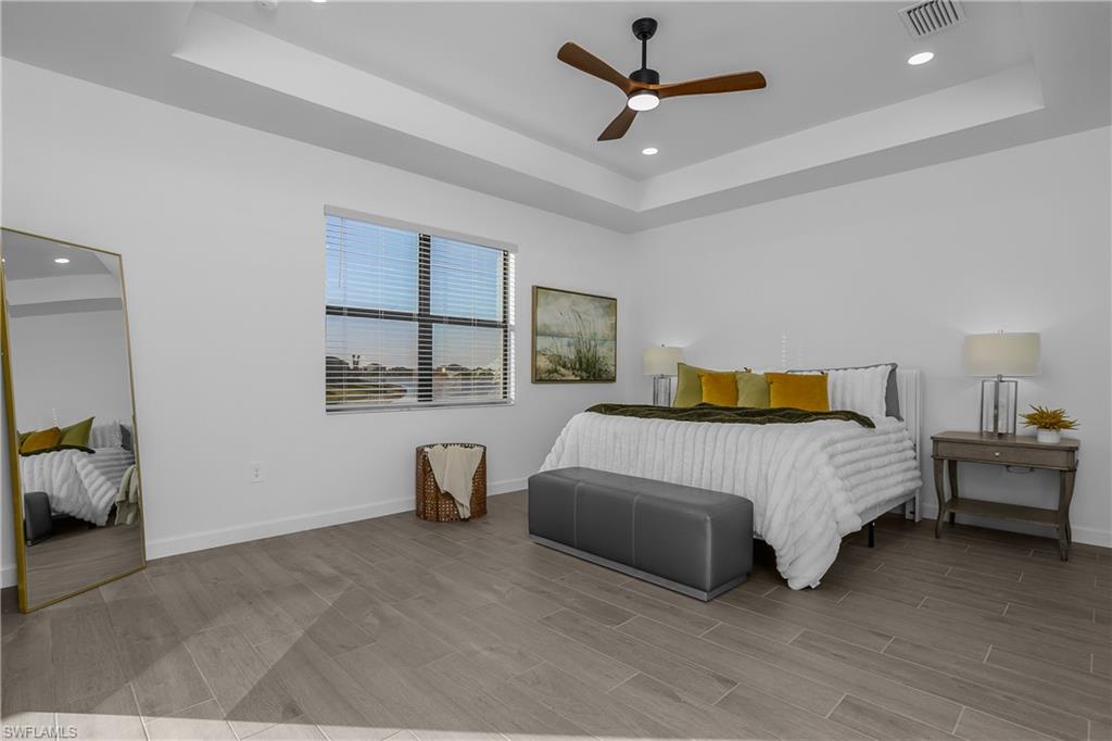 21094 Verawood Loop Estero, FL 33928 - Photo 24 of 49 a bedroom with a bed and window