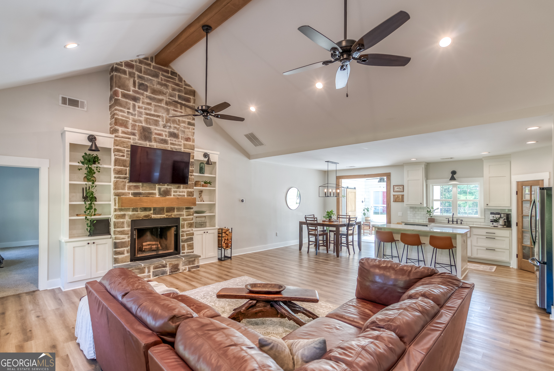 1281 Chilton Woods Road Rutledge, GA 30663 - Photo 11 of 59 a living room with fireplace furniture and a fireplace
