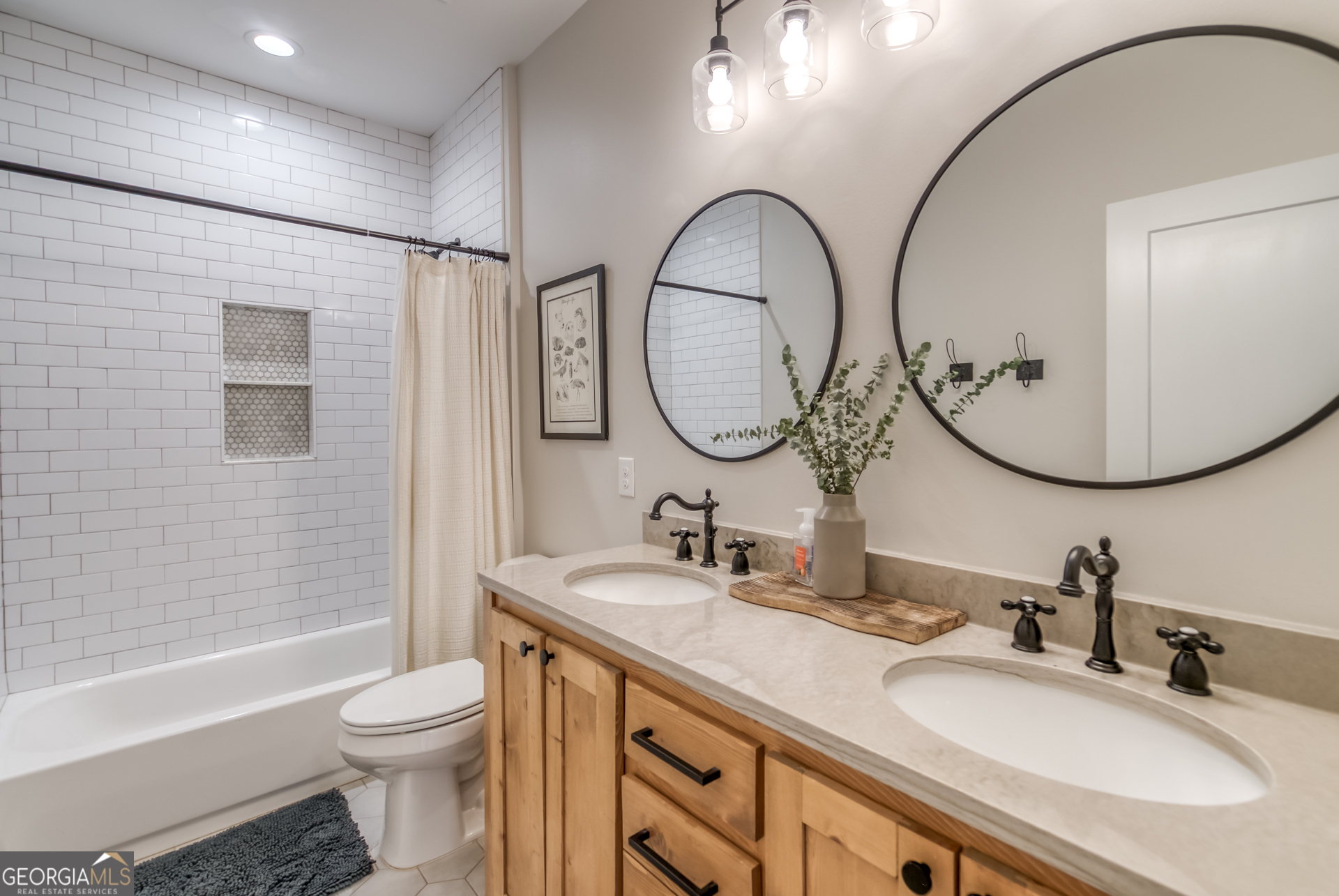 1281 Chilton Woods Road Rutledge, GA 30663 - Photo 46 of 59 a bathroom with a granite countertop toilet a sink a mirror a vanity a bathtub and a shower