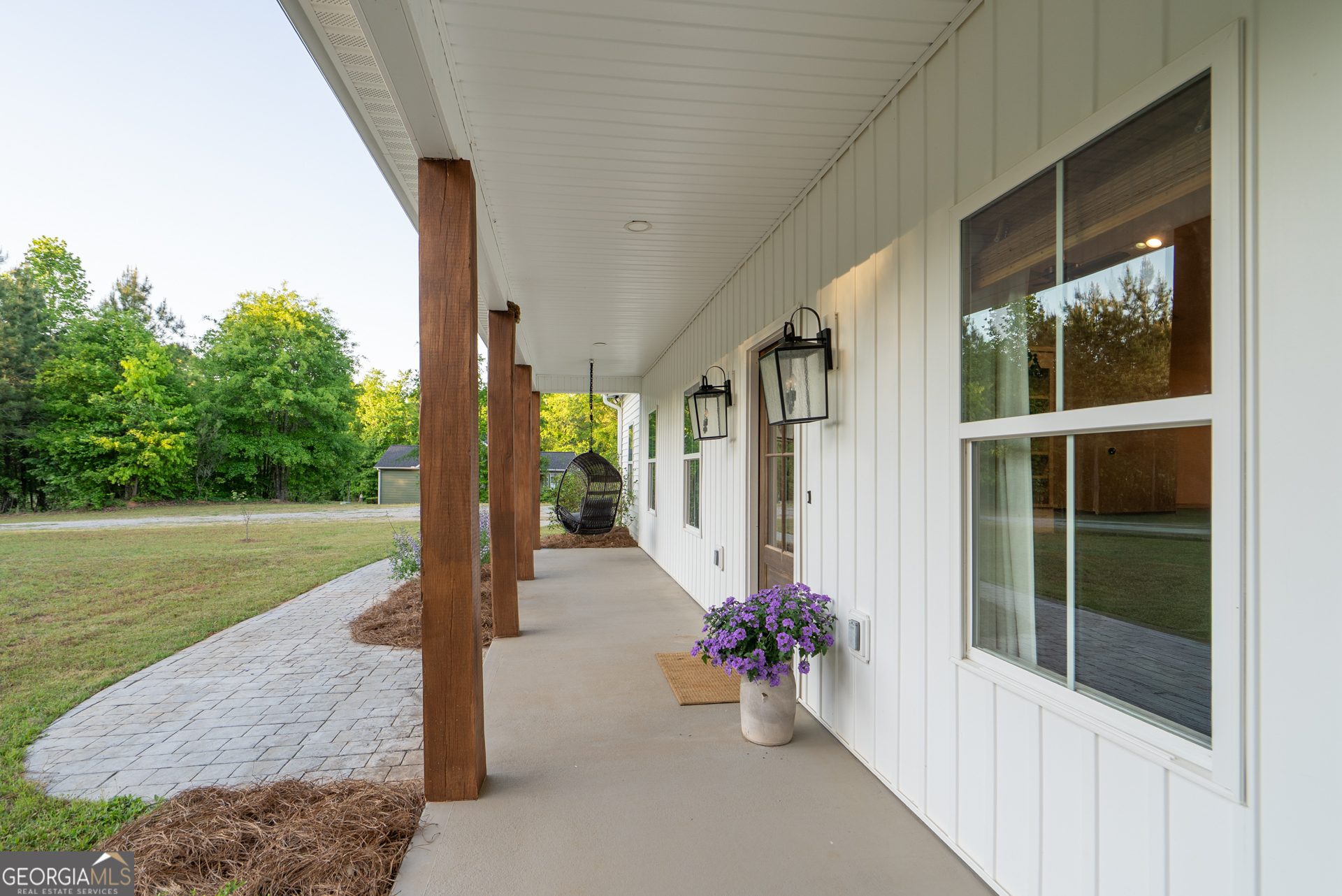 1281 Chilton Woods Road Rutledge, GA 30663 - Photo 8 of 59 a front view of a house with a yard