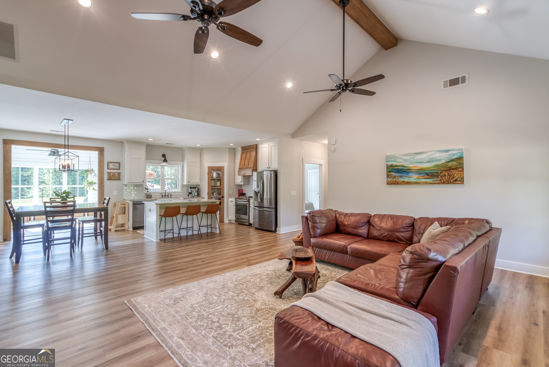 1281 Chilton Woods Road Rutledge, GA 30663 - Photo 10 of 59 a living room with furniture and wooden floor