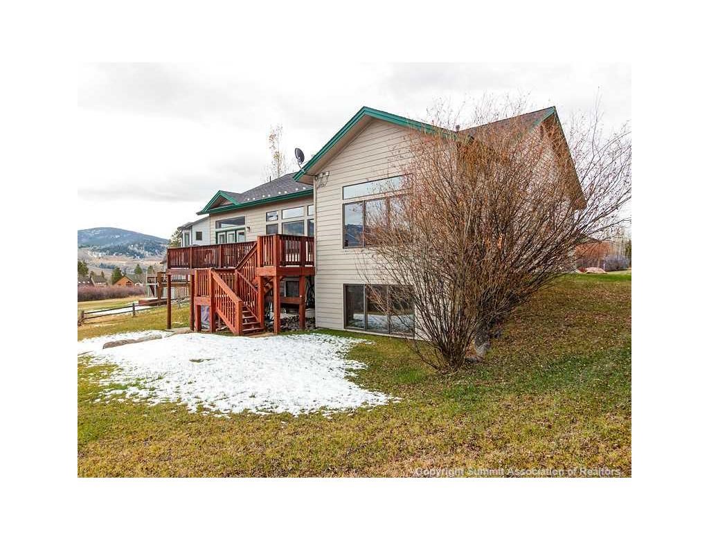718 Eveningstar Road Silverthorne, CO 80498 - Photo 2 of 21 Back Yard..yes you have over 1/2 acre to roam and cross country ski on the golf course.