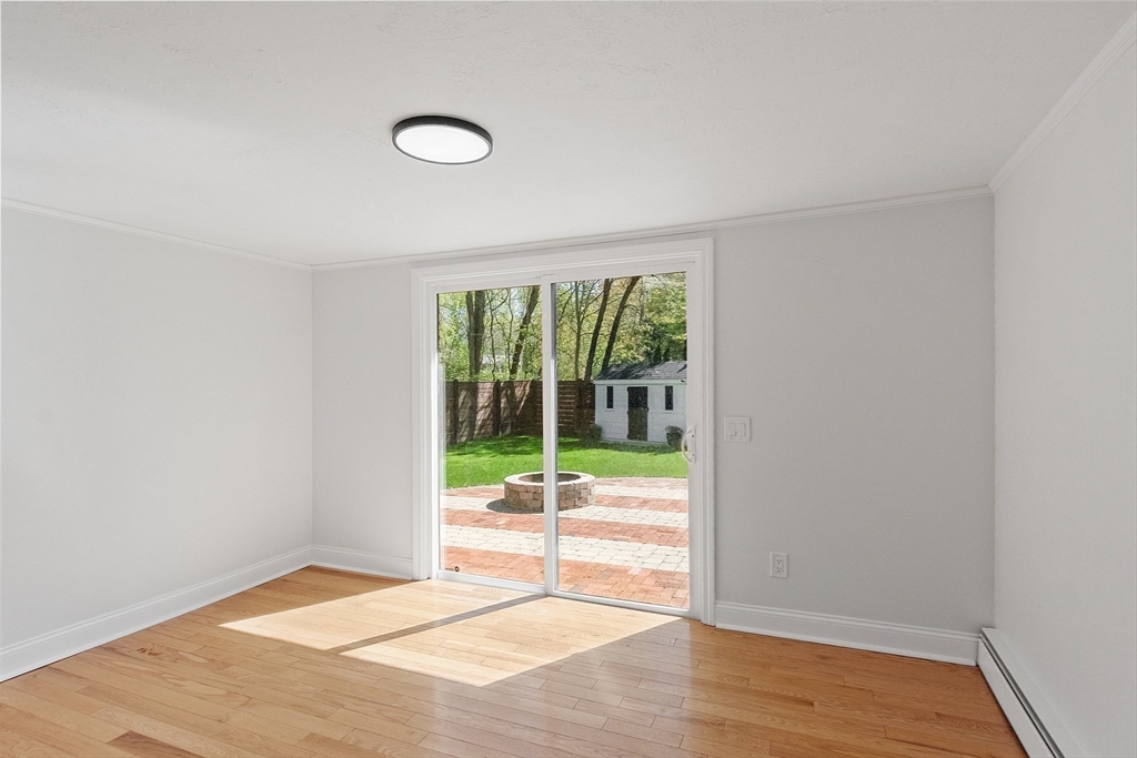 43 Public Road Lancaster, MA 01523 - Photo 15 of 31 a view of an empty room and wooden floor