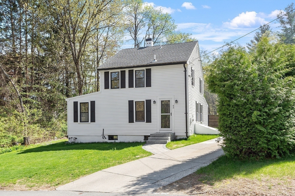 43 Public Road Lancaster, MA 01523 - Photo 25 of 31 a front view of a house with garden