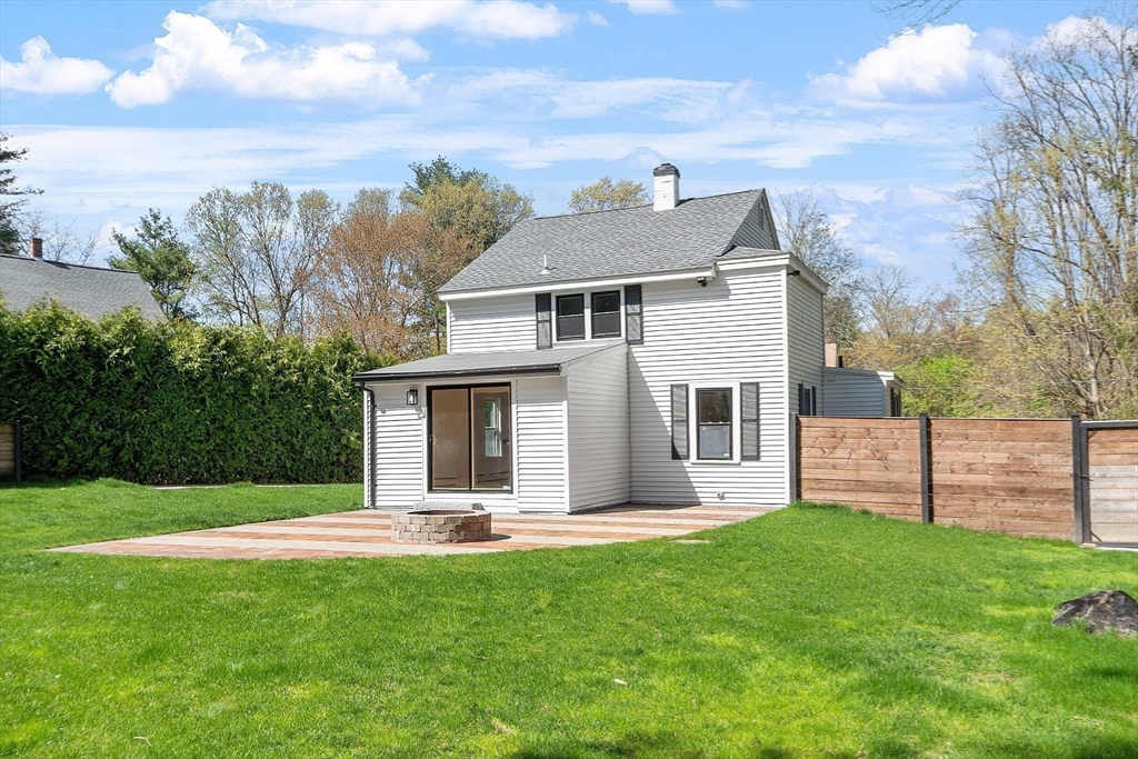 43 Public Road Lancaster, MA 01523 - Photo 26 of 31 a view of a house with yard and a garden
