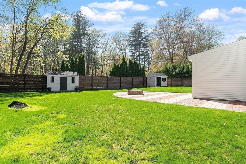 43 Public Road Lancaster, MA 01523 - Photo 28 of 31 a swimming pool with outdoor seating and yard
