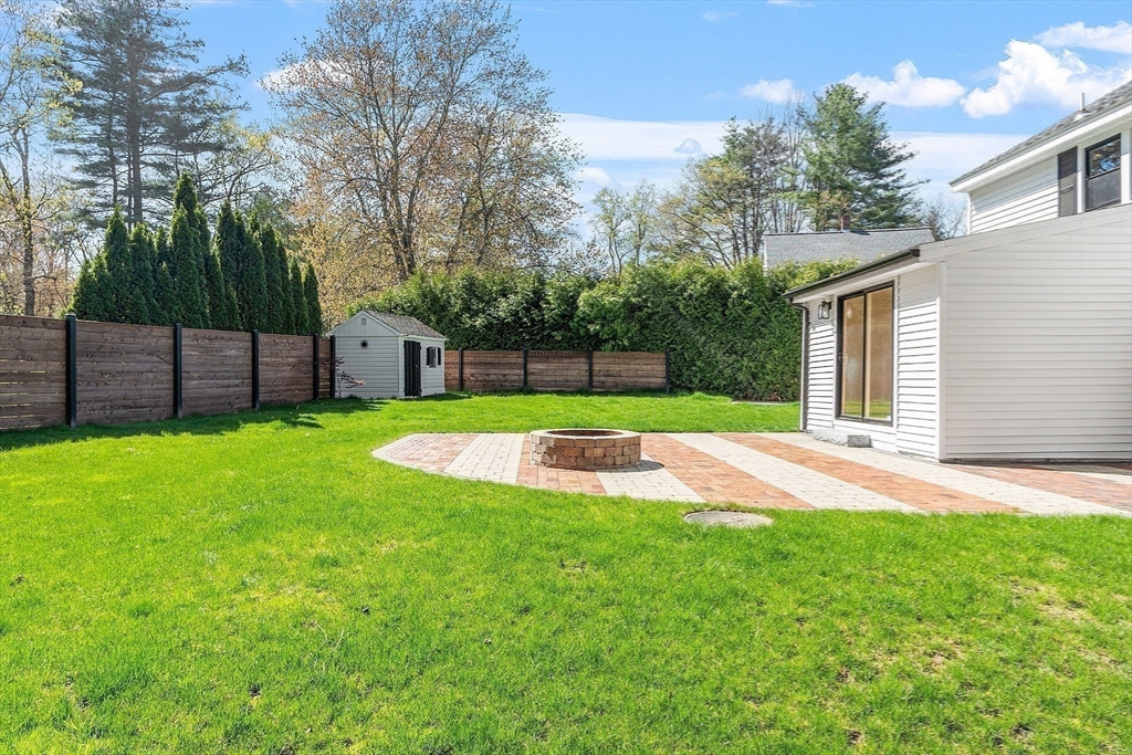 43 Public Road Lancaster, MA 01523 - Photo 29 of 31 a view of a backyard with a small cabin