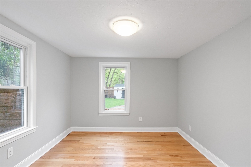 43 Public Road Lancaster, MA 01523 - Photo 10 of 31 an empty room with a window