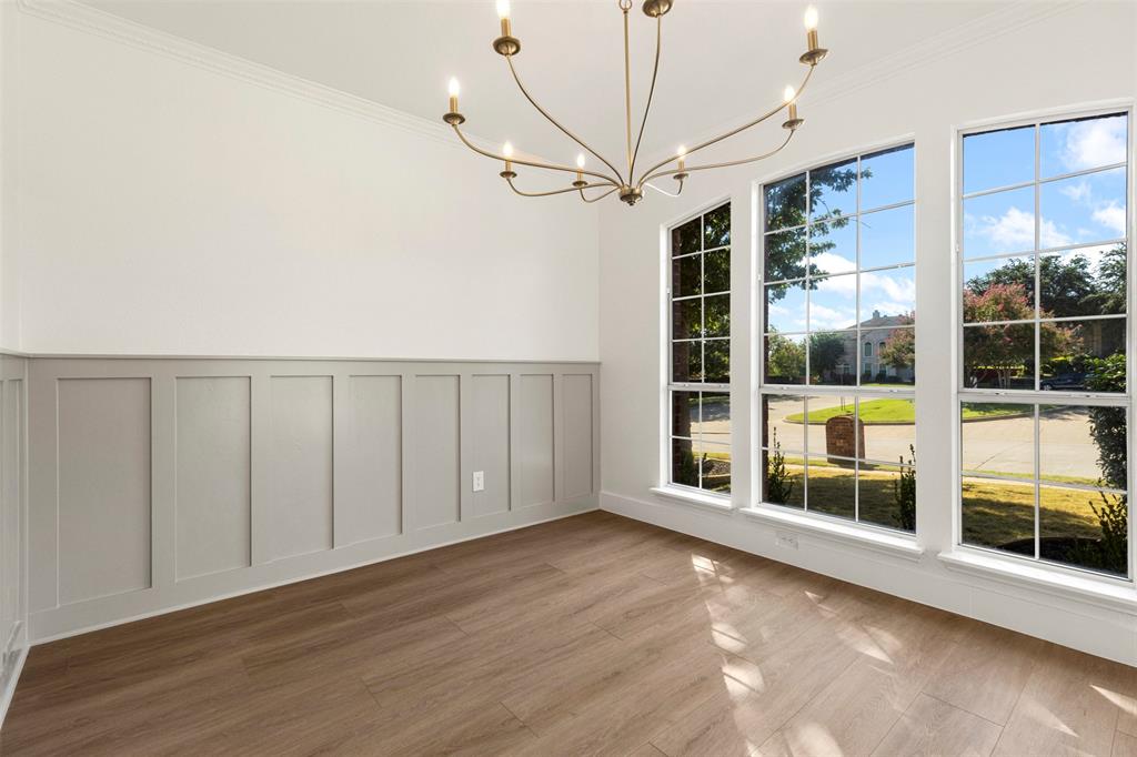 421 Ridge Meade Drive Lewisville, TX 75067 - Photo 17 of 36 a view of an empty room with a window