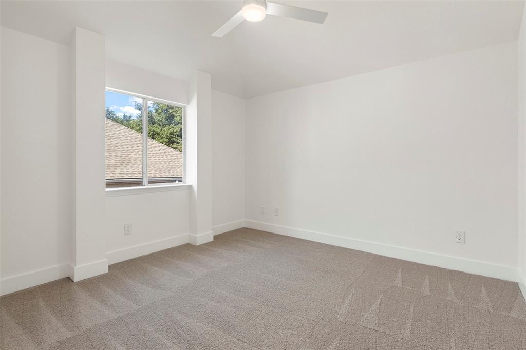 421 Ridge Meade Drive Lewisville, TX 75067 - Photo 25 of 36 an empty room with a window