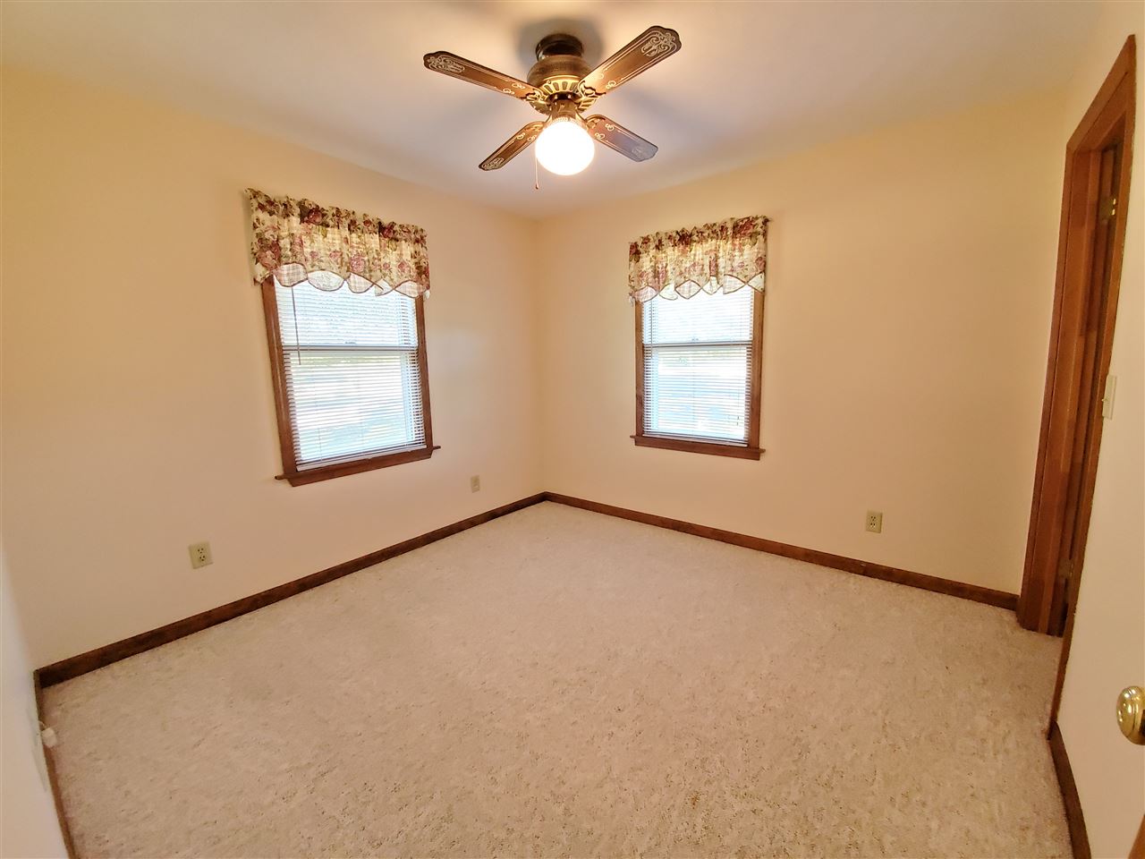 1176 Daysville Road Oregon, IL 61061 - Photo 17 of 34 an empty room with windows and fan