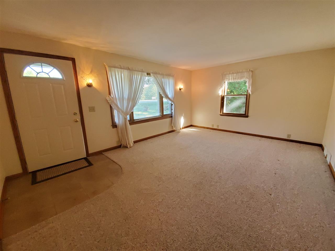 1176 Daysville Road Oregon, IL 61061 - Photo 2 of 34 an empty room with windows and entrance