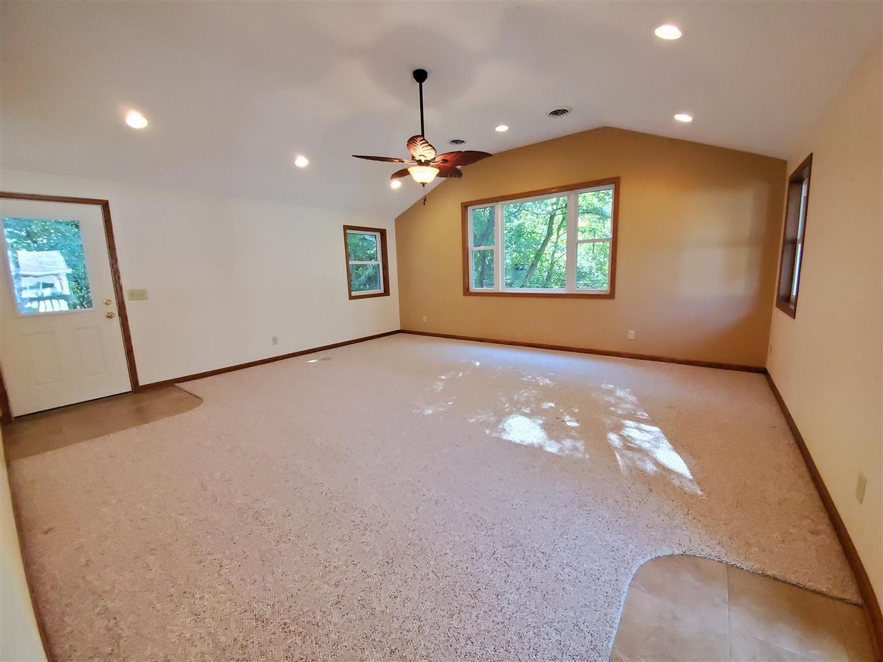 1176 Daysville Road Oregon, IL 61061 - Photo 4 of 34 a view of a livingroom with a ceiling fan and window
