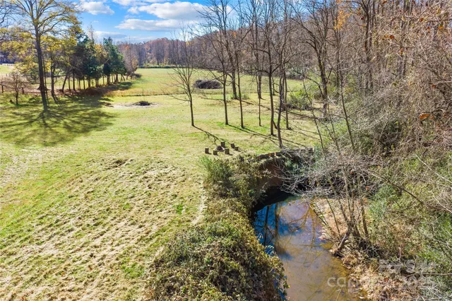 a view of swimming pool of water with outdoor seating
