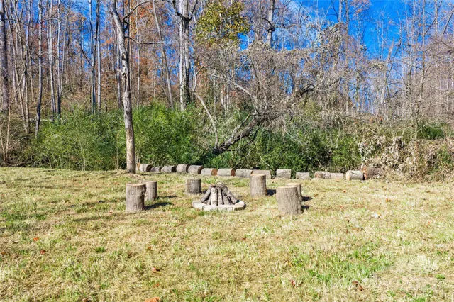 a view of a backyard of the house