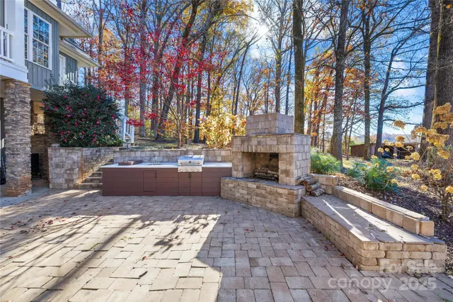 a view of house with outdoor space and sitting area