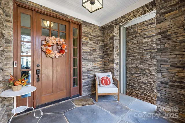 a view of an outdoor space with a table and chairs