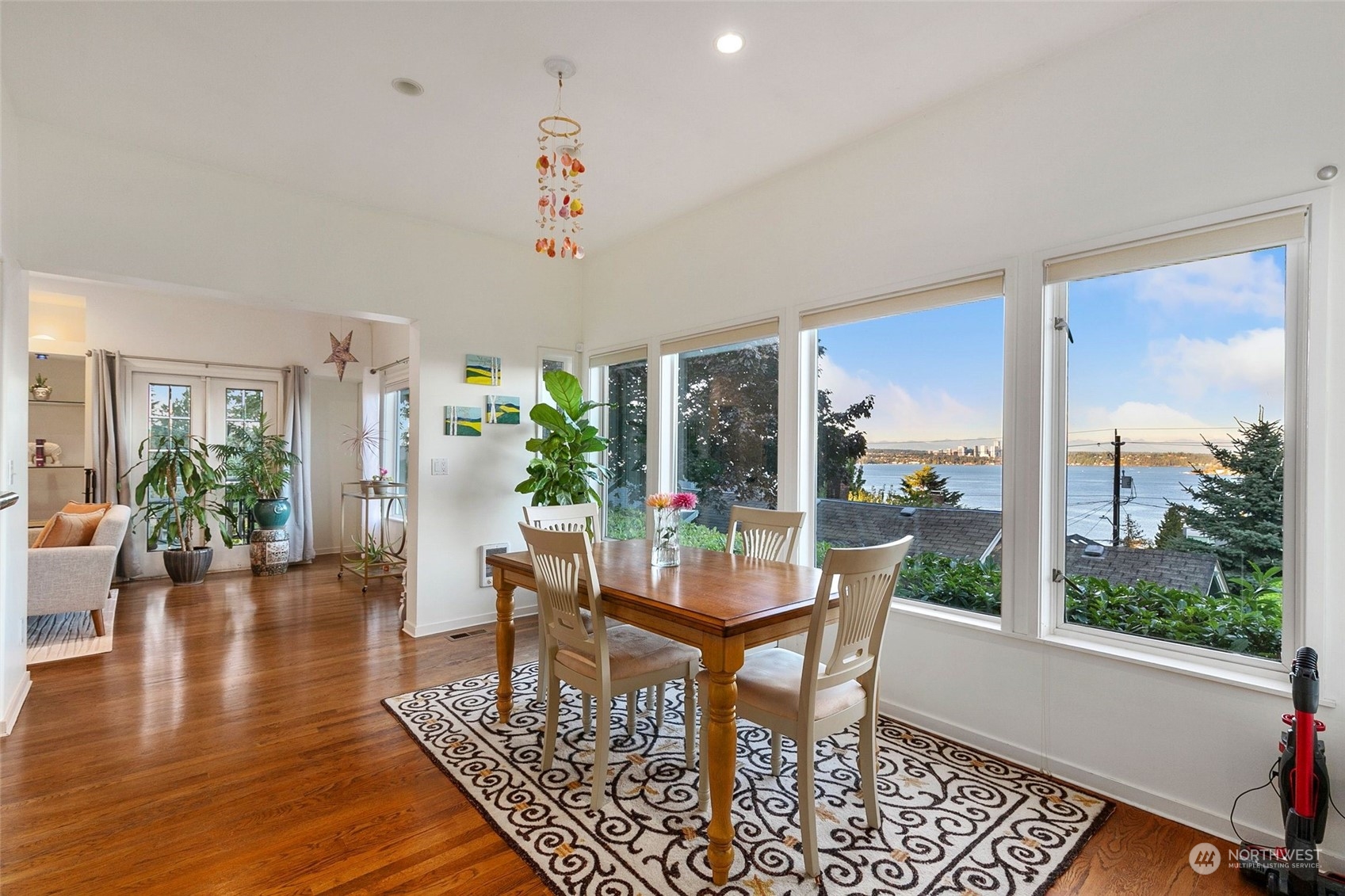 3205 South Judkins Street Seattle, WA 98144 - Photo 12 of 40 a view of a dining room with furniture window and wooden floor
