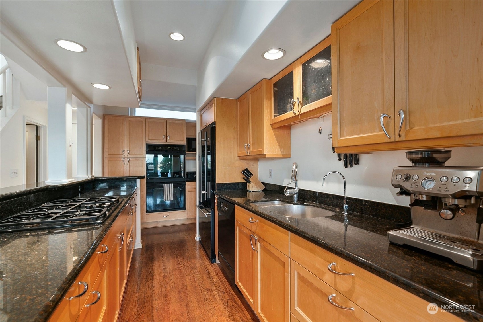 3205 South Judkins Street Seattle, WA 98144 - Photo 15 of 40 a kitchen with granite countertop a stove and a sink