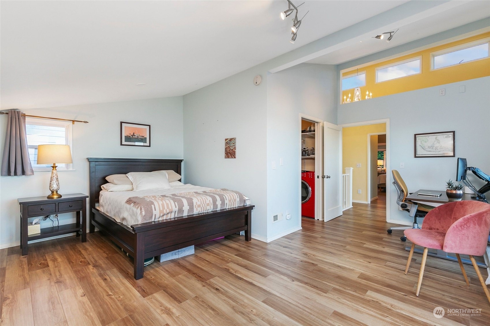 3205 South Judkins Street Seattle, WA 98144 - Photo 28 of 40 a spacious bedroom with a bed and a chair