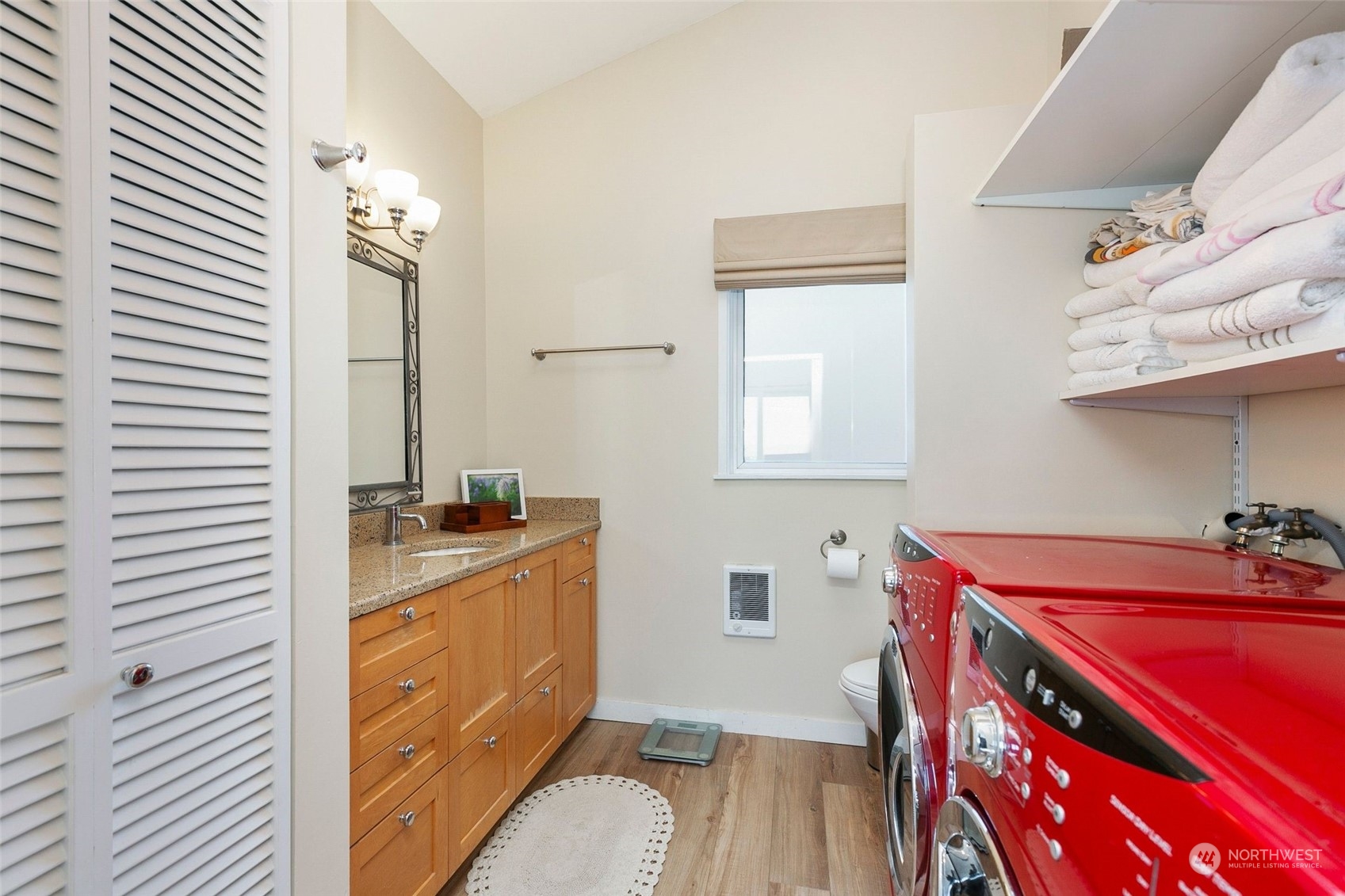 3205 South Judkins Street Seattle, WA 98144 - Photo 29 of 40 a kitchen with a sink stove and cabinets