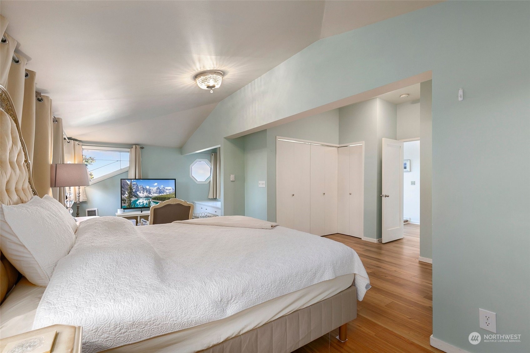 3205 South Judkins Street Seattle, WA 98144 - Photo 30 of 40 a bedroom with a bed and wooden floor