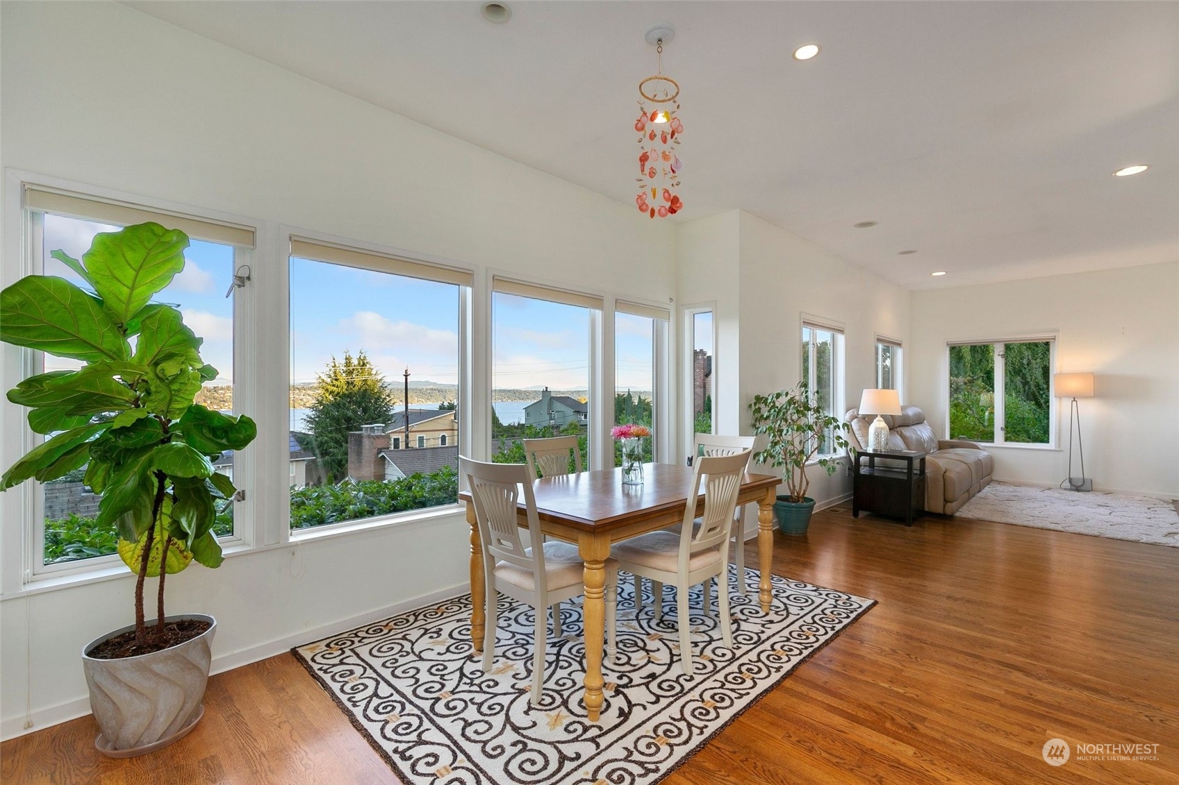 3205 South Judkins Street Seattle, WA 98144 - Photo 9 of 40 a living room with furniture potted plant and a large window