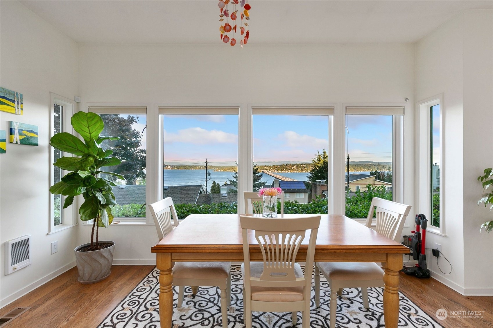 3205 South Judkins Street Seattle, WA 98144 - Photo 10 of 40 a dining room with furniture window and wooden floor